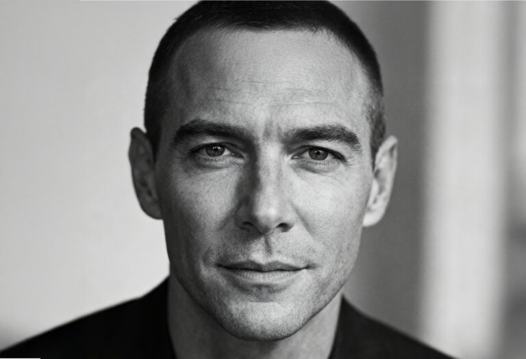 freepik__editorial-monochrome-portrait-of-a-cleanshaven-mal__87975